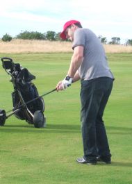 Suds, wearing his virgin cap in 2008, showing a delicate touch around the green